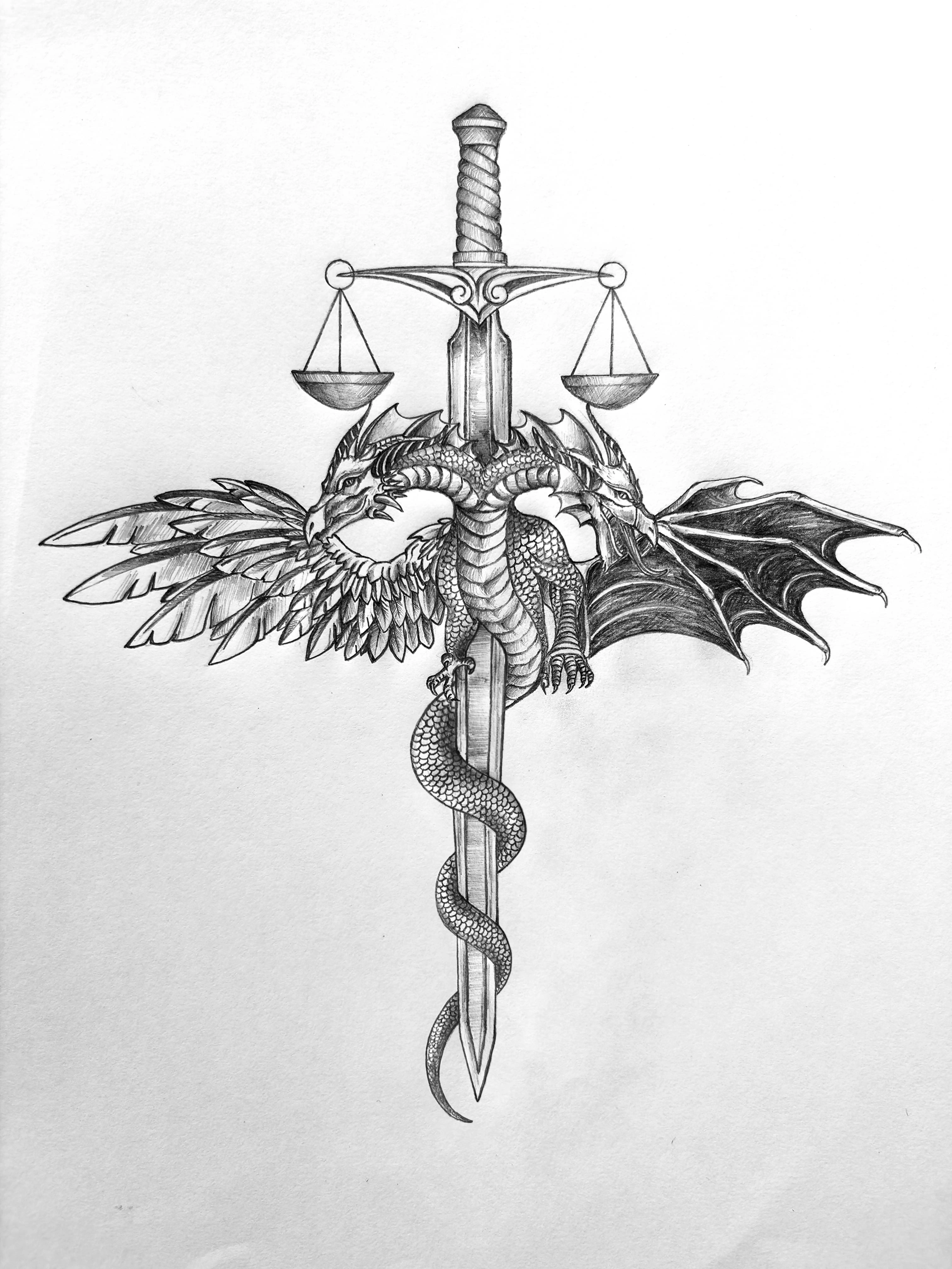 Overhead shot of an artist's desk with complex pencil sketches